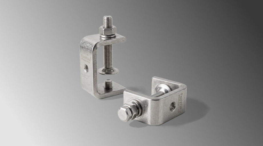 Two miniature c-clamps.